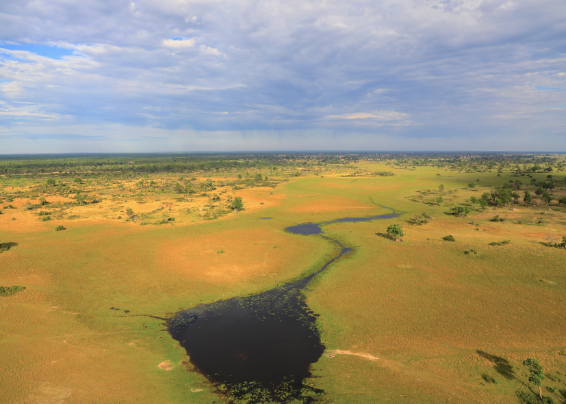 Coucher de soleil sur le delta de l'Okavango vu du ciel, Nirvatravel voyage